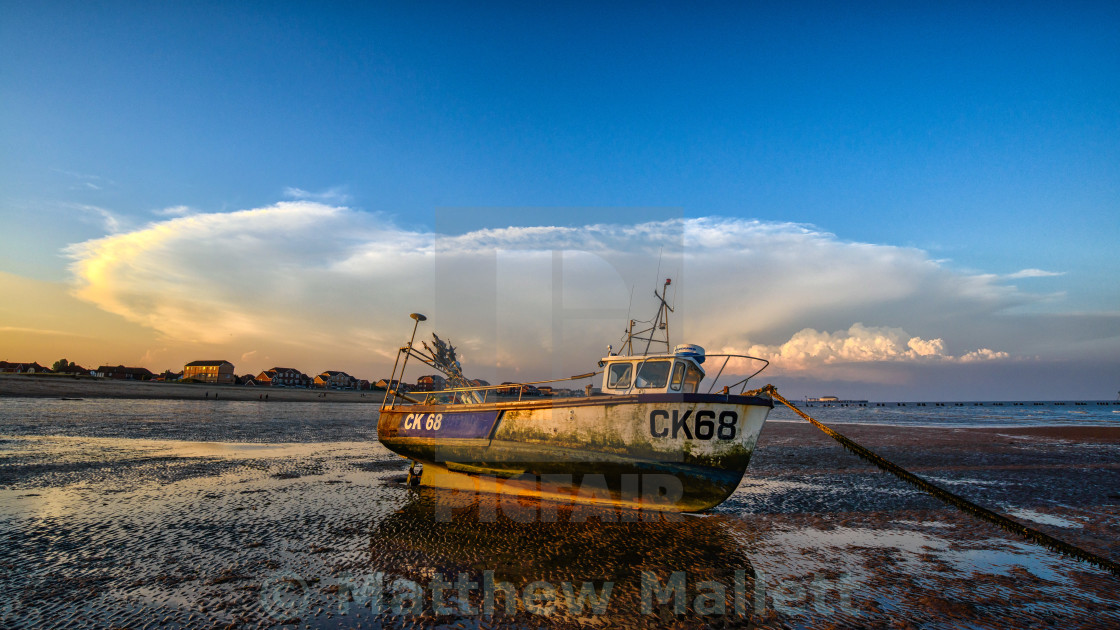 "Martello Beach Mooring With Weather Front Approaching" stock image