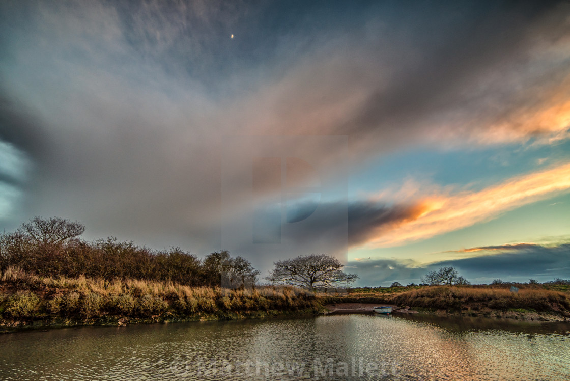 "Moon And Storm Over Essex Backwaters" stock image