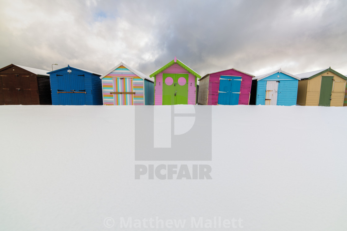 "Snow Beach Huts Of Harwich" stock image