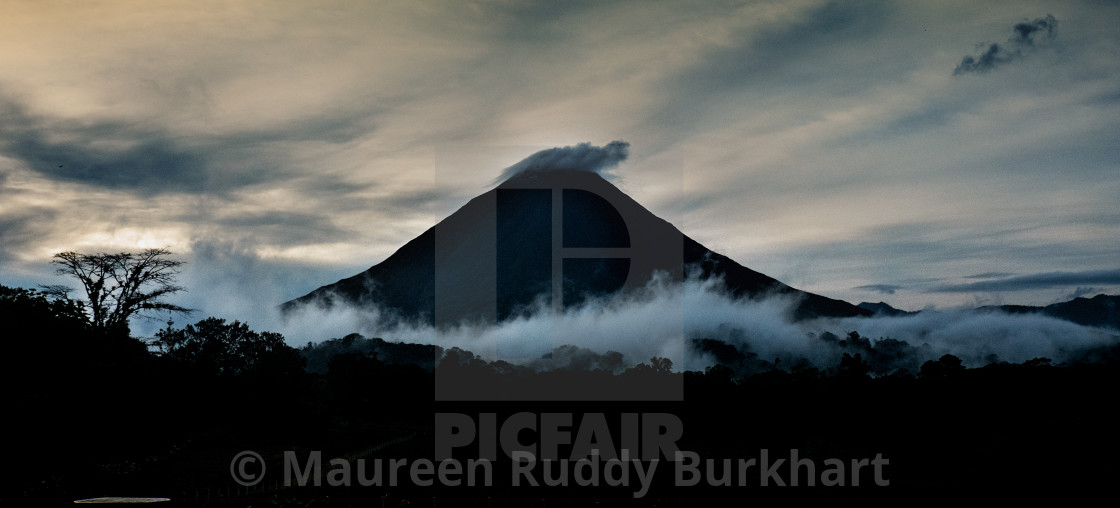 "Dawn at Vulcan Arenal" by Maureen Ruddy Burkhart - $38.89 "Dawn at Vulcan Arenal" stock image