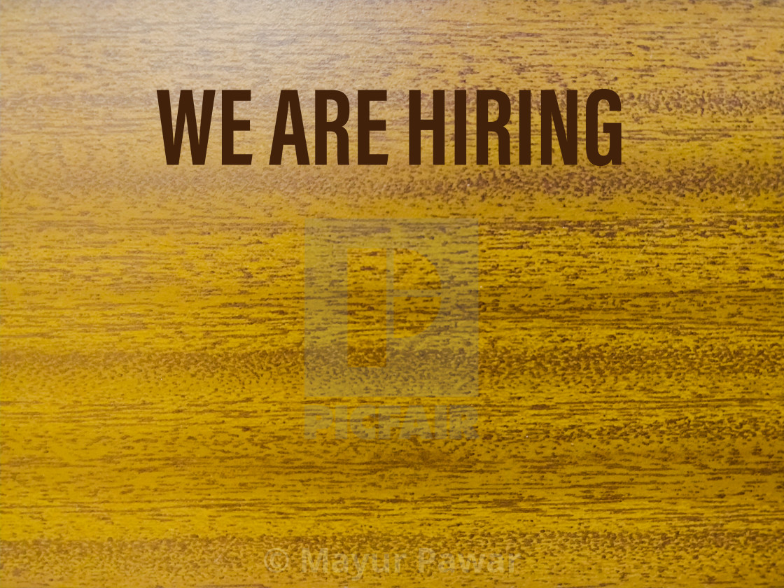 we are hiring template on a wooden background - License, download or print  for £ | Photos | Picfair