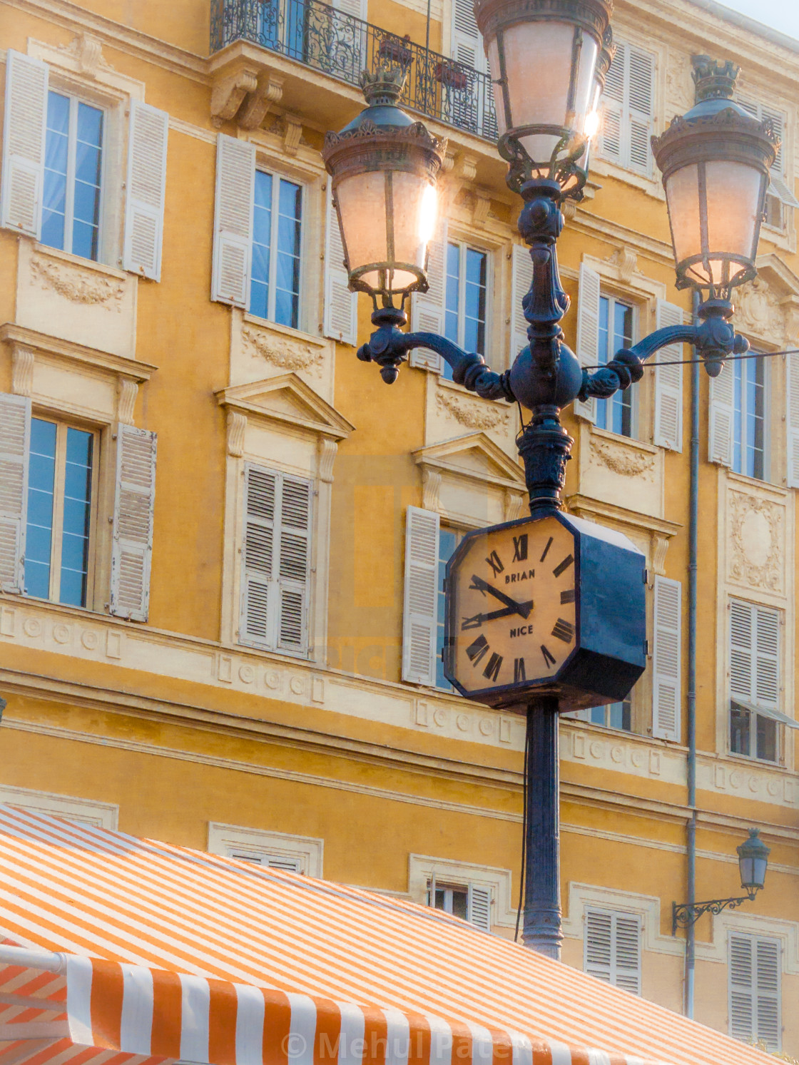 Soft Focus Effect Clock On Lamp Post Nice Market Cote D Azur Soft Focus Effect Clock On Lamp Post Nice Market Cote D