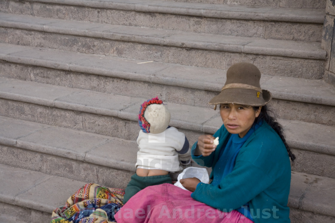 "PERUVIAN MOTHER AND BABY'S BUTT" stock image