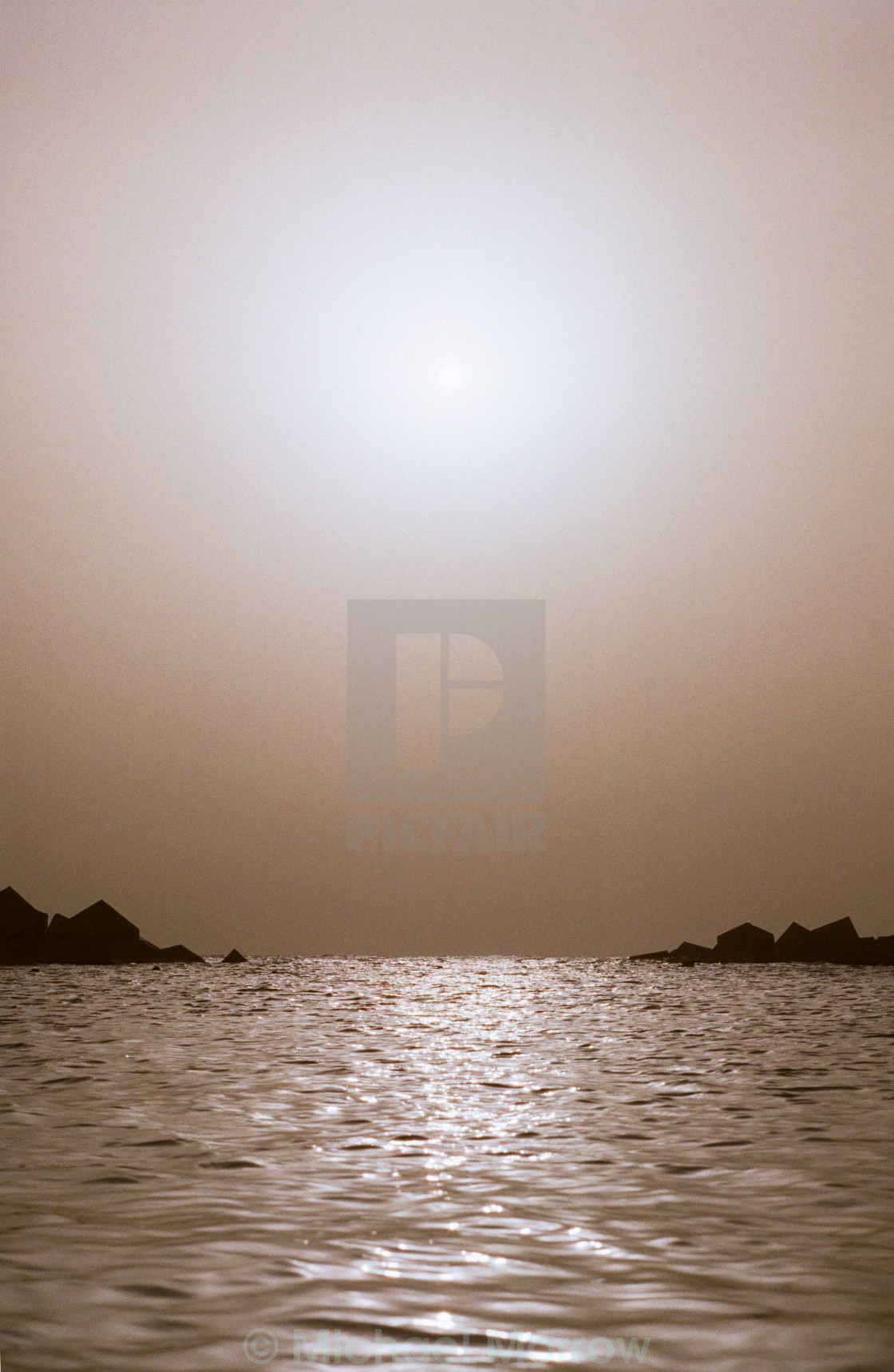 "Swimming at Sunset" by Michael Morrow - £7.44 "Swimming at Sunset" stock image