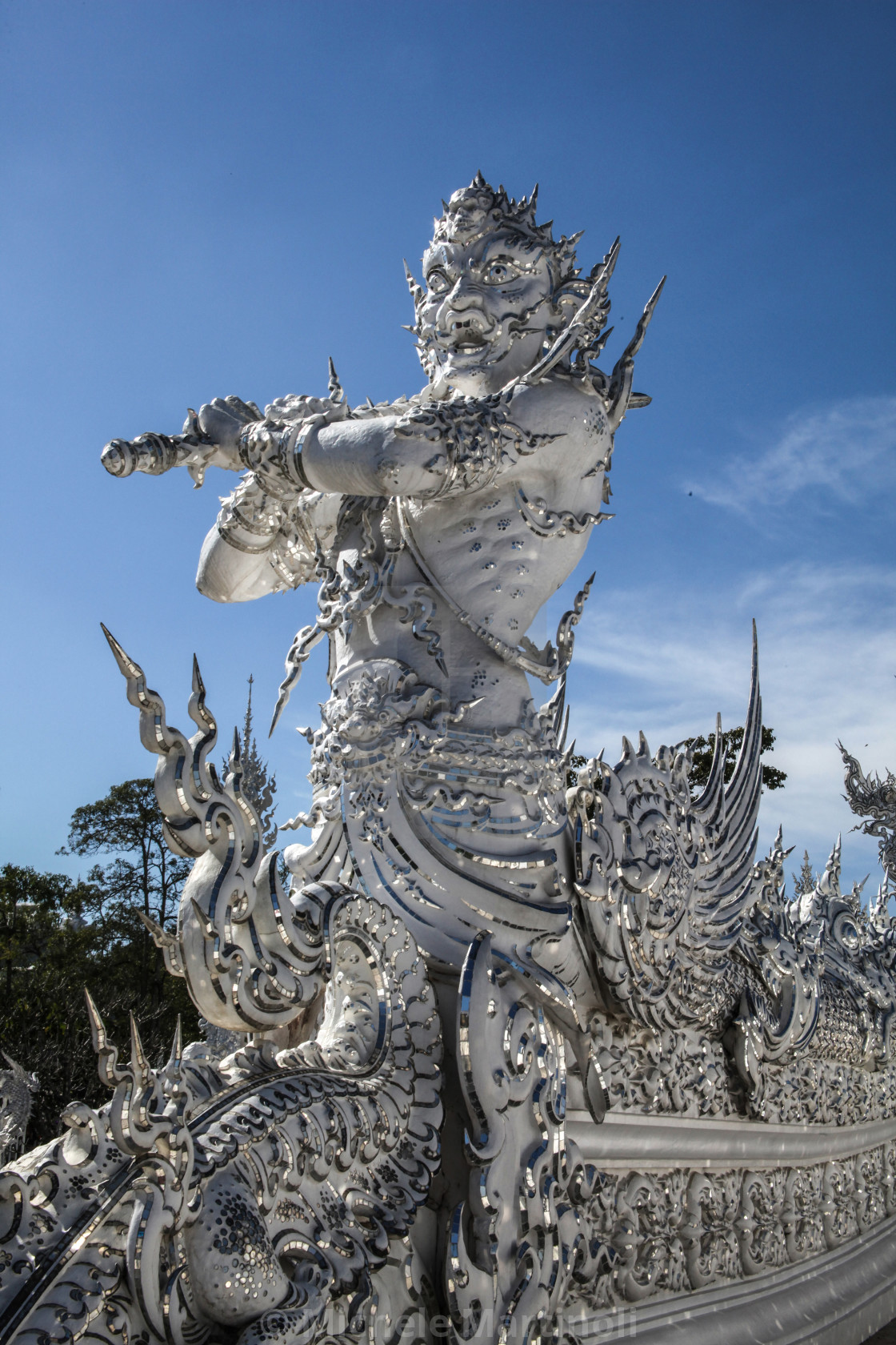 "Mythological Statue protecting White Temple, Chiang Rai" by Michele Martinoli - $50.80 "Mythological Statue protecting White Temple, Chiang Rai" stock image