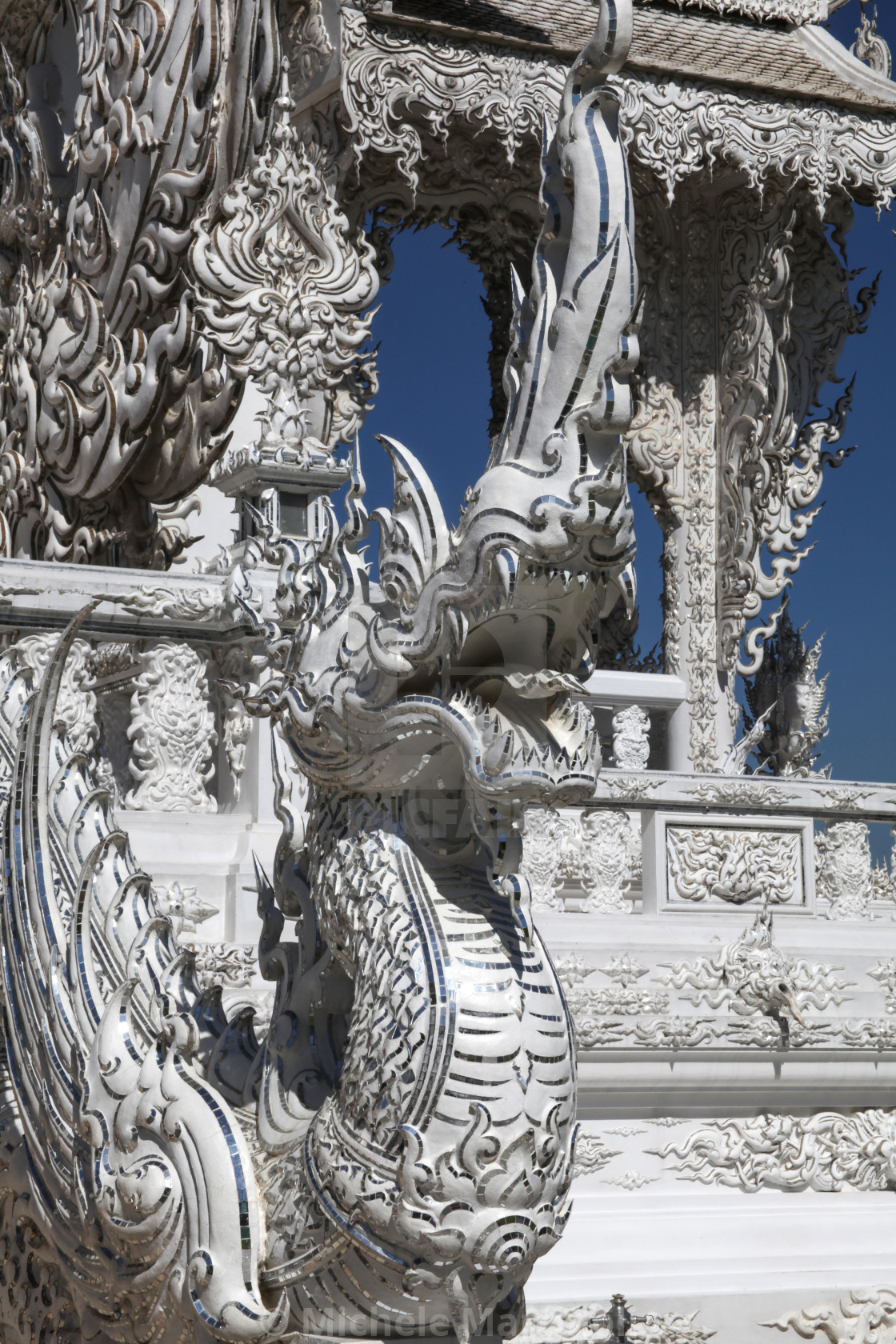 "Mythological flying dragon, White Temple, Chiang Rai" by Michele Martinoli - $24.87 "Mythological flying dragon, White Temple, Chiang Rai" stock image