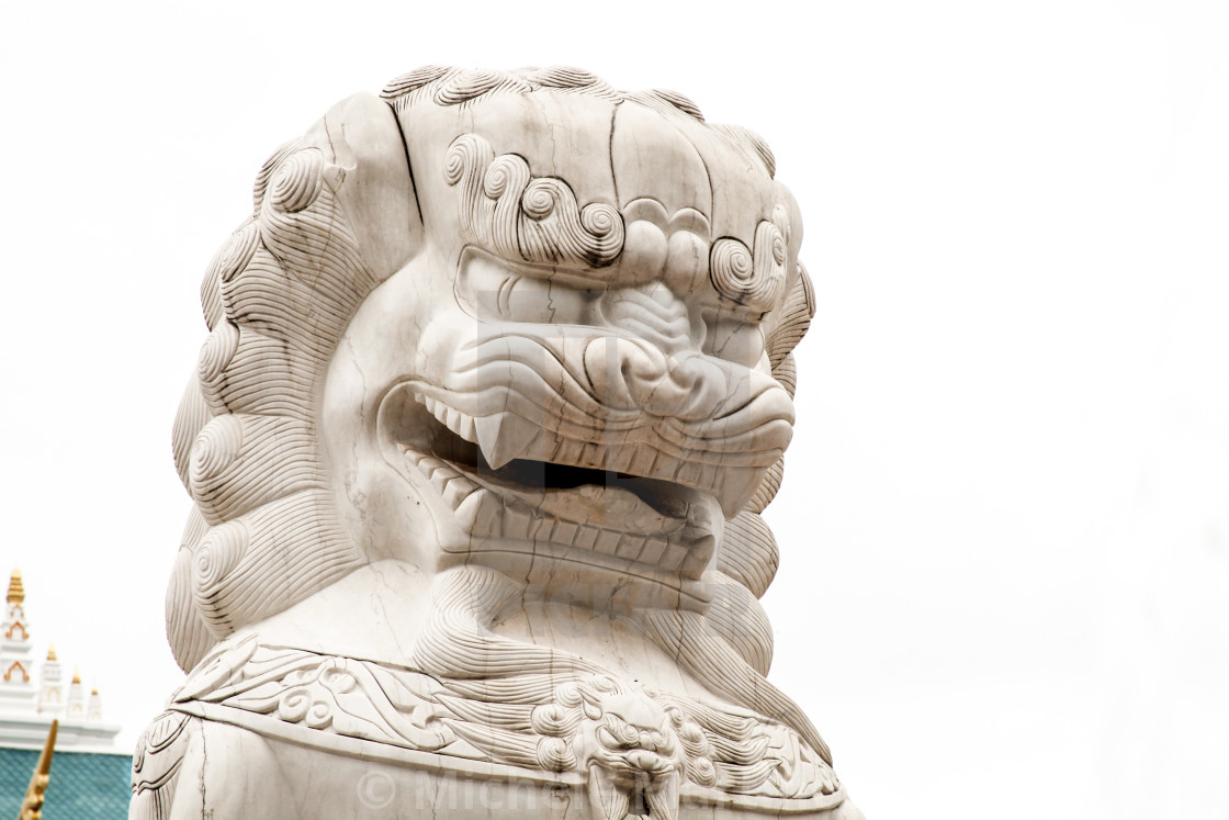 "Mythological Lion statue protecting Buddhist Temple" by Michele Martinoli - $12.70 "Mythological Lion statue protecting Buddhist Temple" stock image