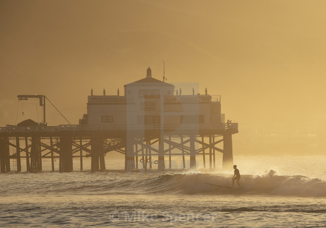 "Sunrise surfer at Malibu" stock image