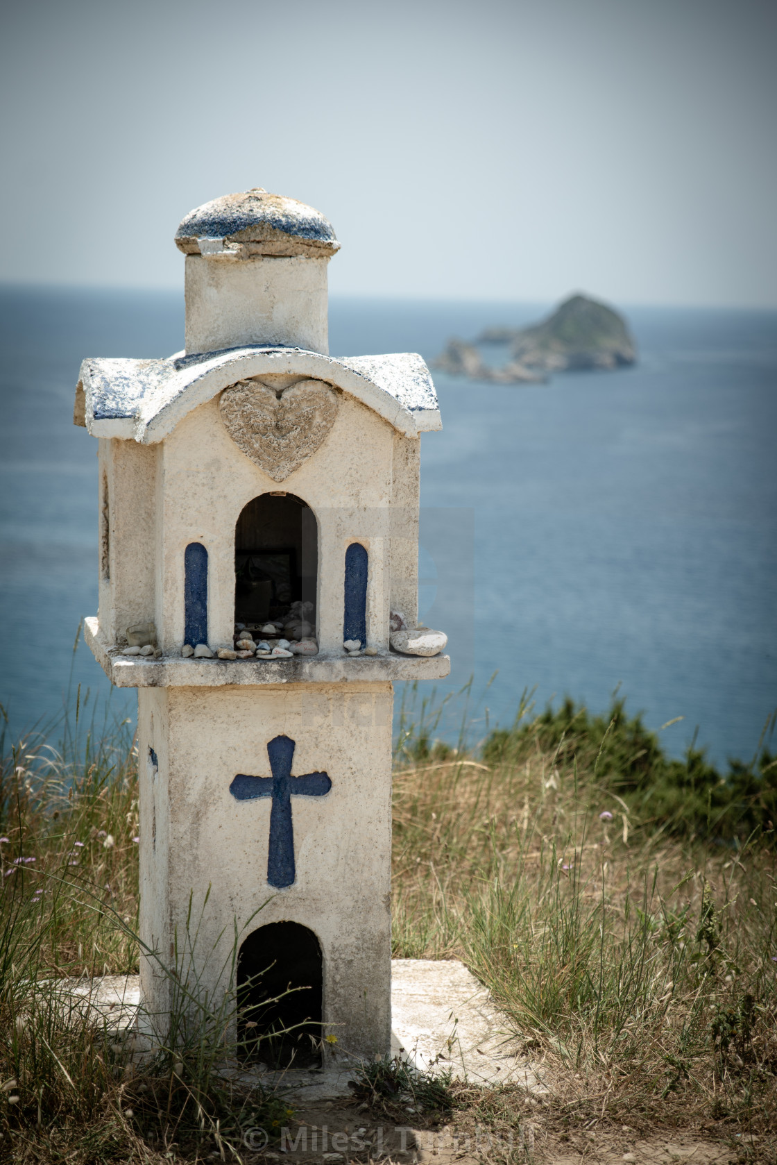 "Beautiful Greek shrine with sea and island" stock image