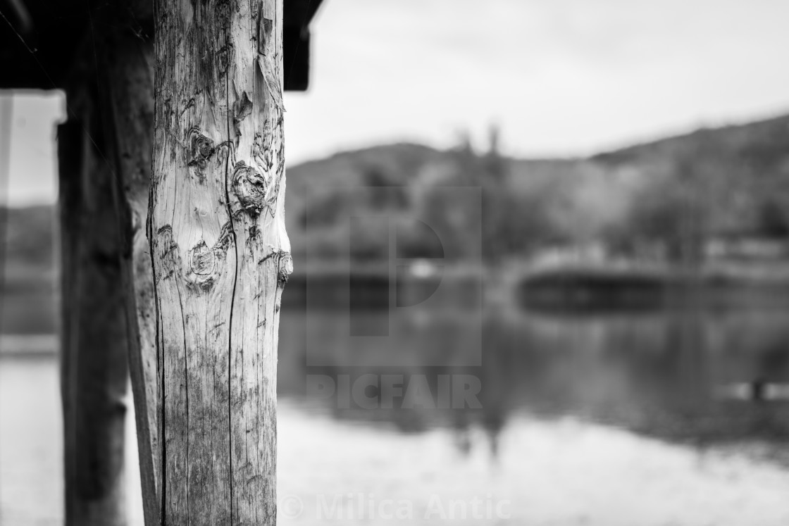 "Close-up shot of a lake pier" by Milica Antic - £12.40 "Close-up shot of a lake pier" stock image
