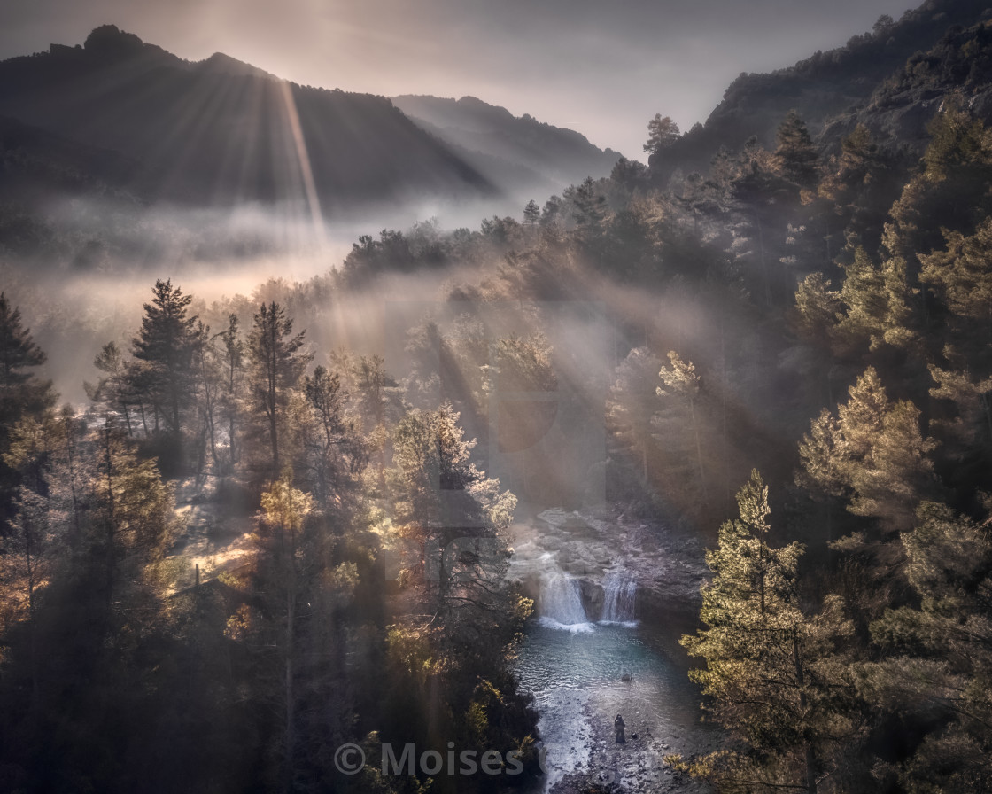 "Waterfall in the foggy forest" by Moises Cugat - $7.67 "Waterfall in the foggy forest" stock image