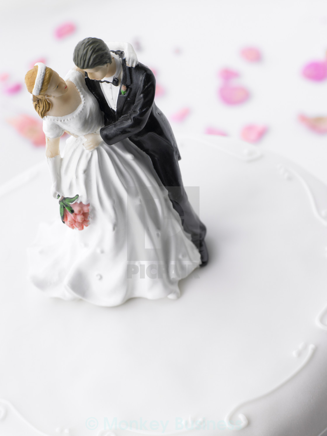 Wedding Cake With Bride And Groom Figurines License Download Or