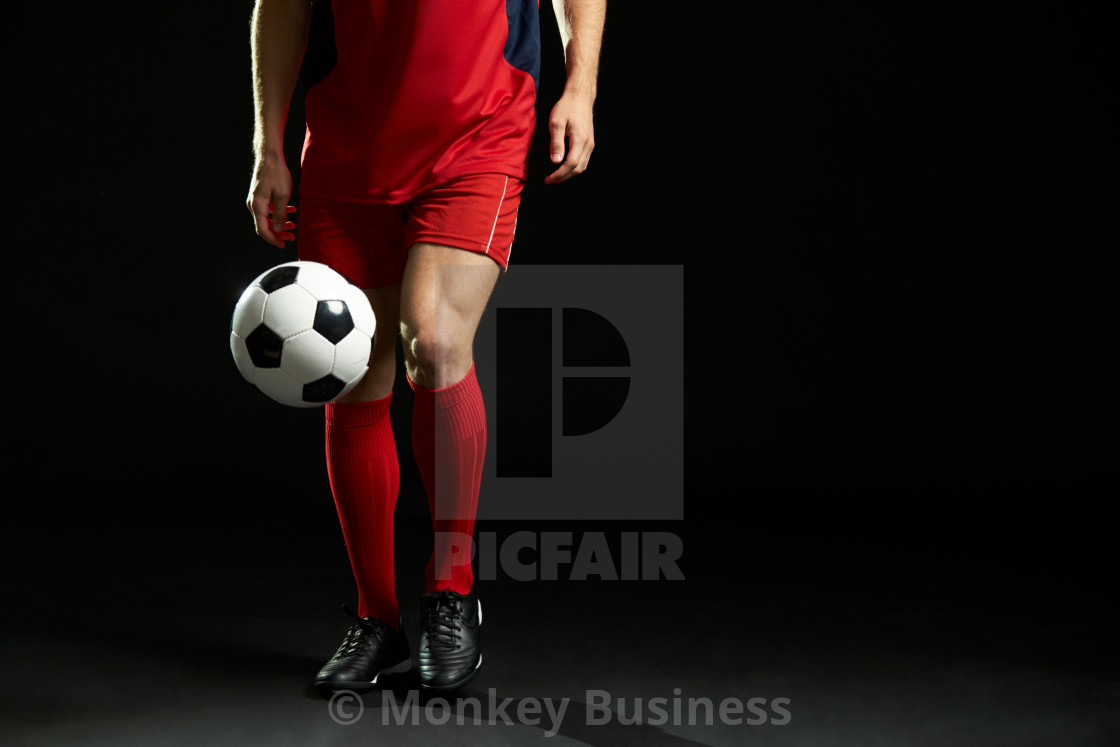 Close Up Of Professional Soccer Player With Ball In Studio License Download Or Print For 12 00 Photos Picfair