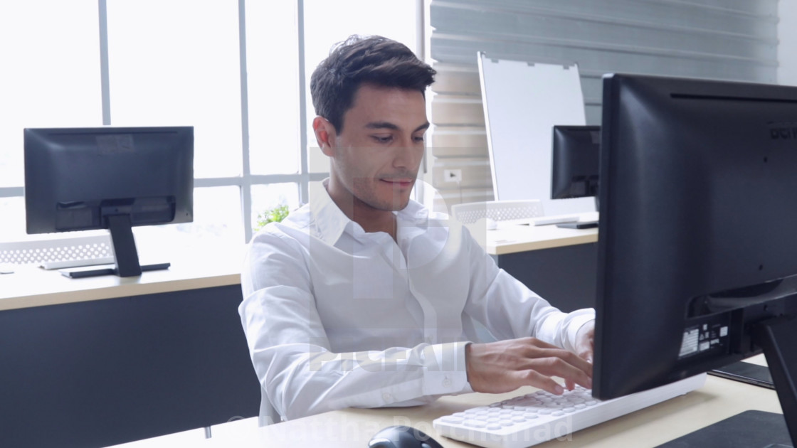 Office boy working at office. - License, download or print for £ |  Photos | Picfair