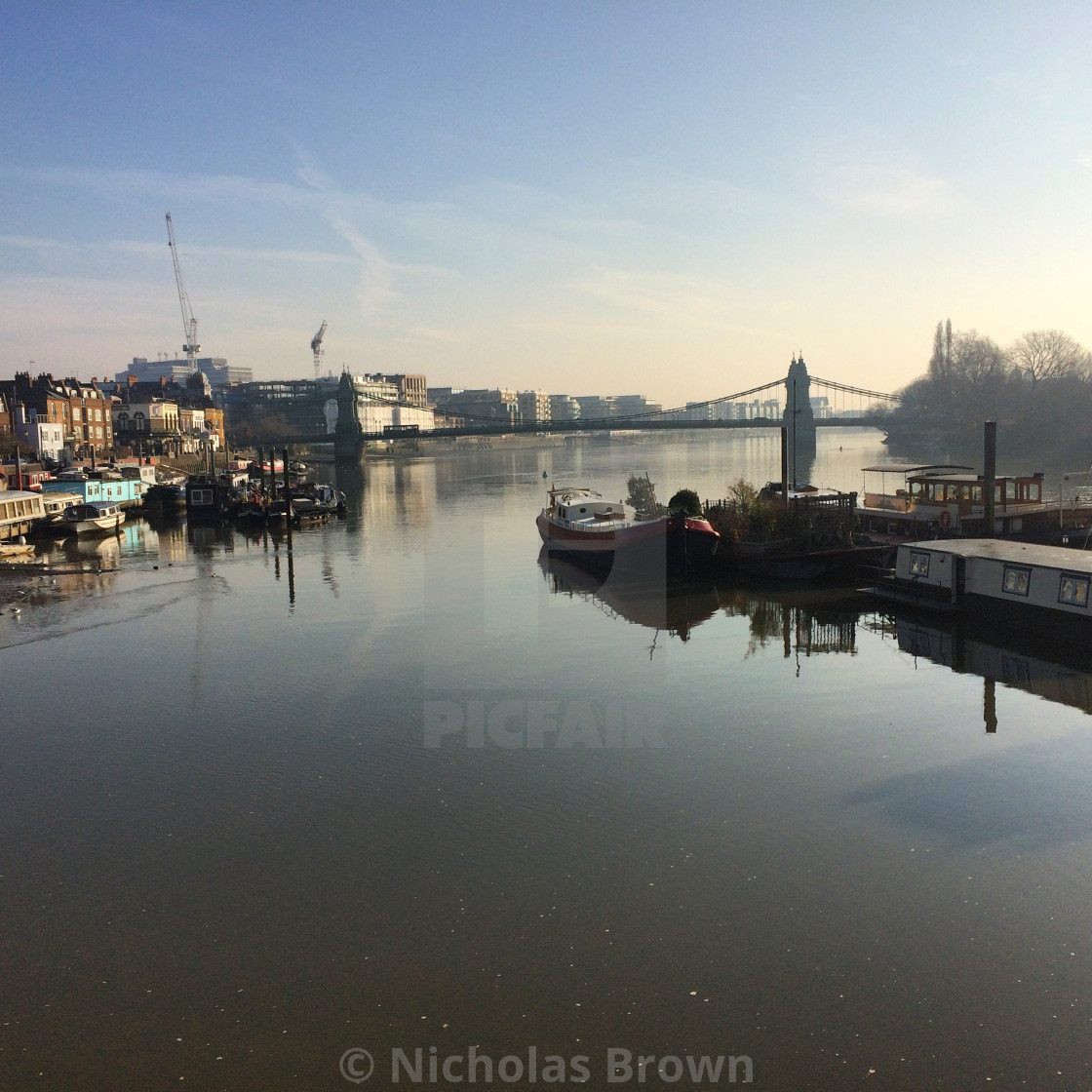 "Houseboats and Hammersmith Bridge" stock image