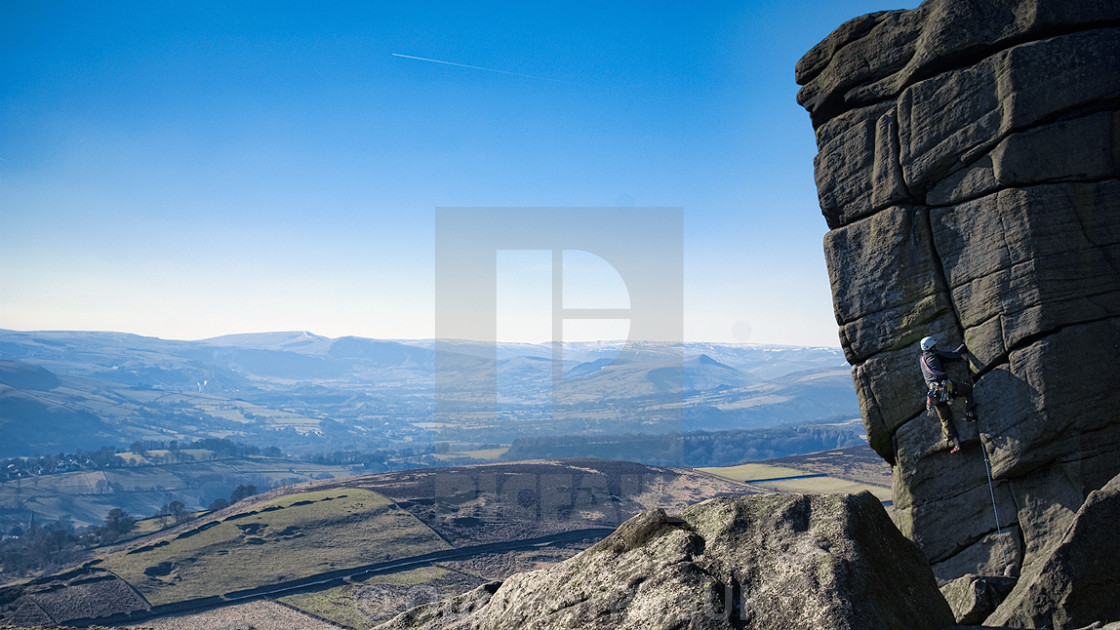 "Climbing at Higger Tor, Derbyshire, Peak District National Park" by OutdoorPicsUK - £9.99 "Climbing at Higger Tor, Derbyshire, Peak District National Park" stock image