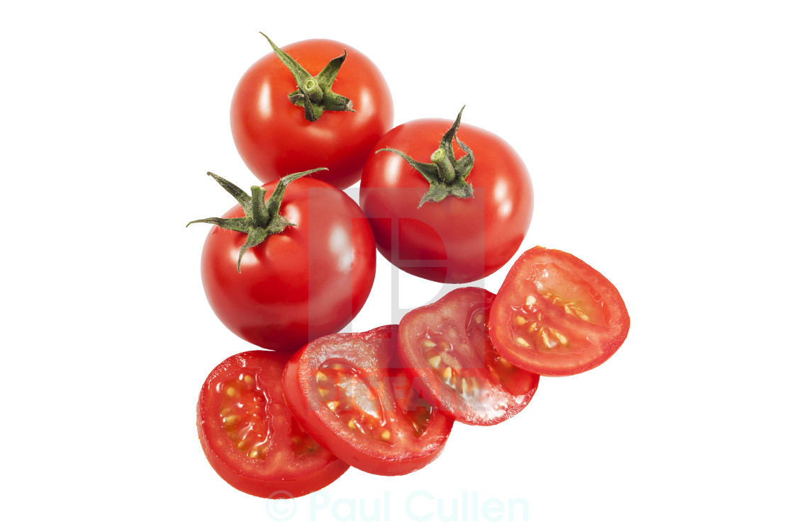 "One sliced Tomato and three whole" stock image