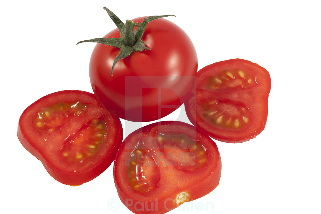 "Sliced Tomato and a Whole Tomato" stock image