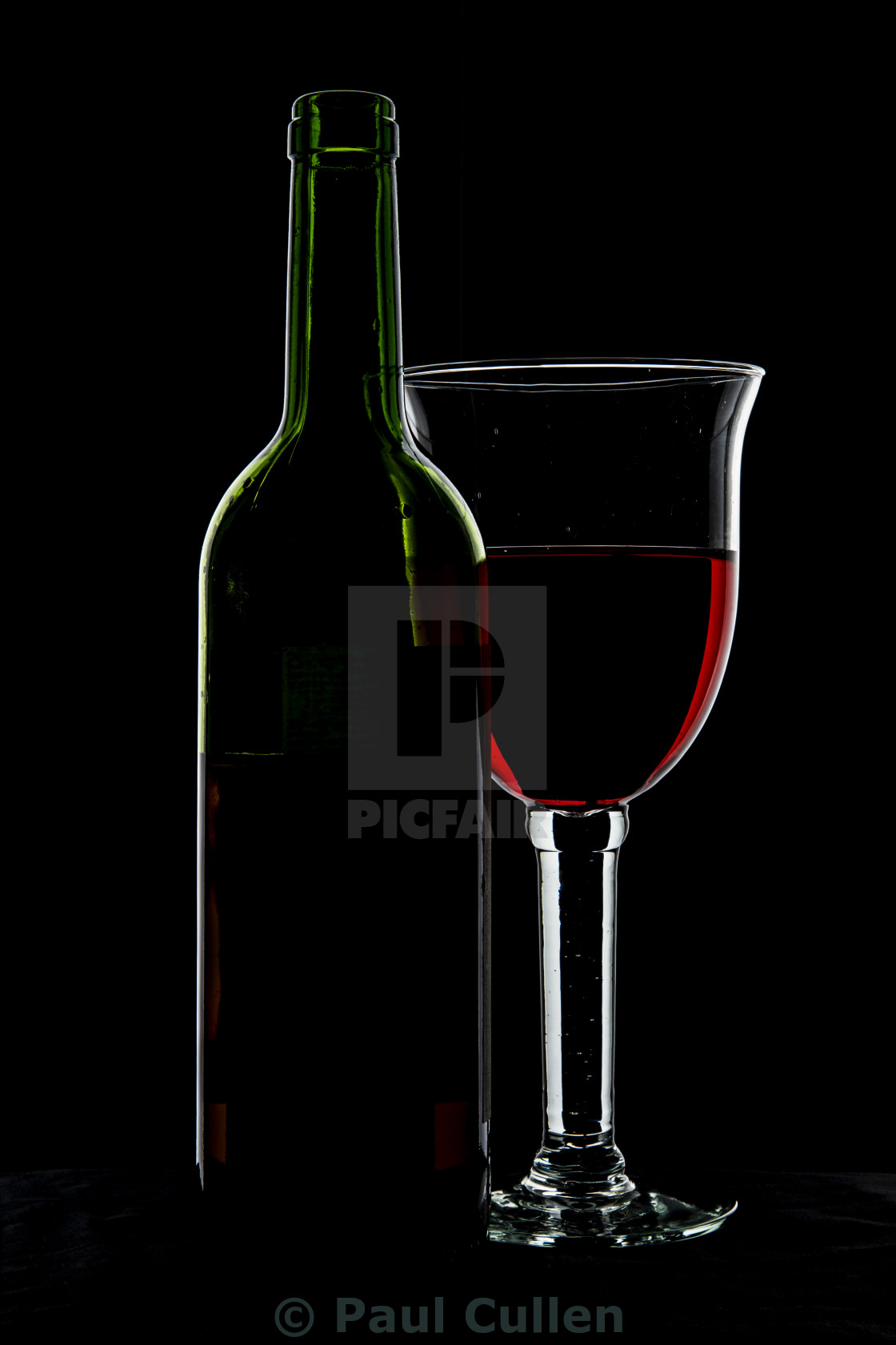 "Wine glass and bottle." stock image