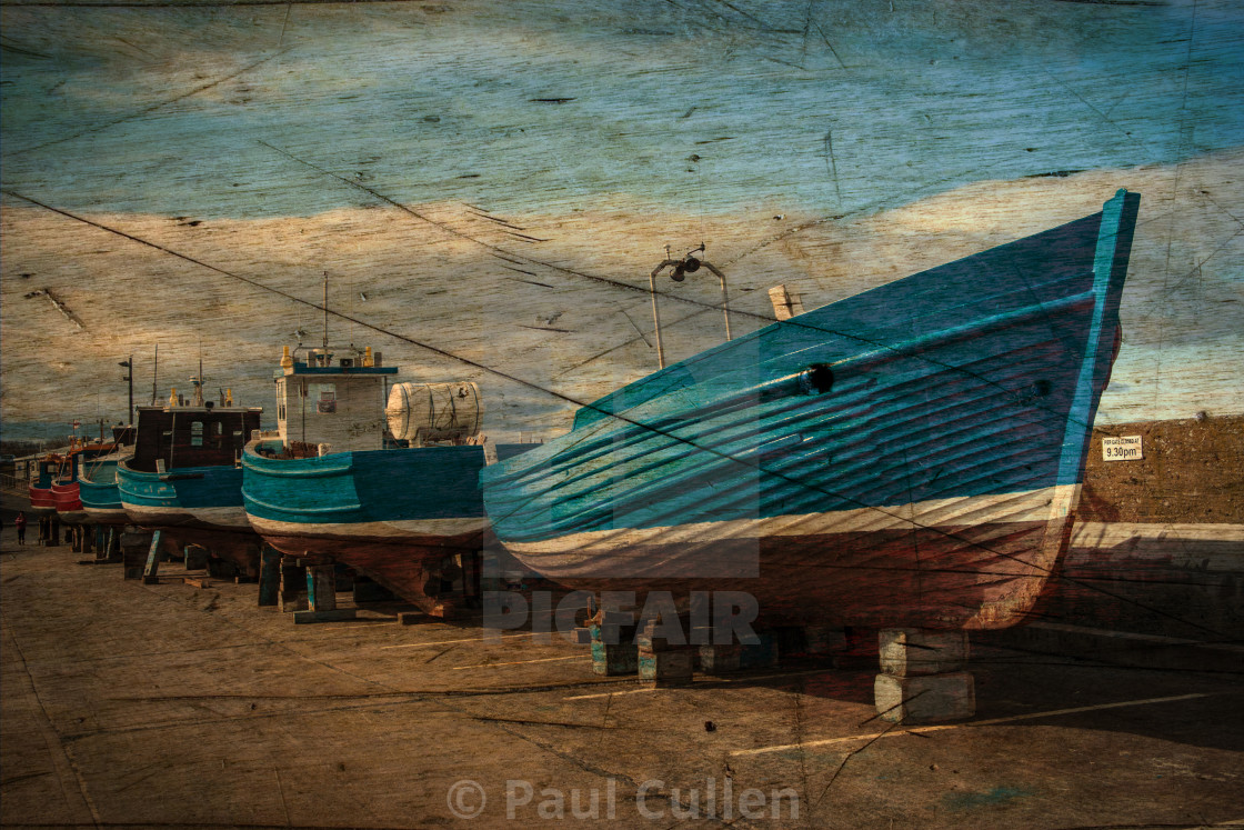 "Seahouses Boats hauled out for Winter." stock image