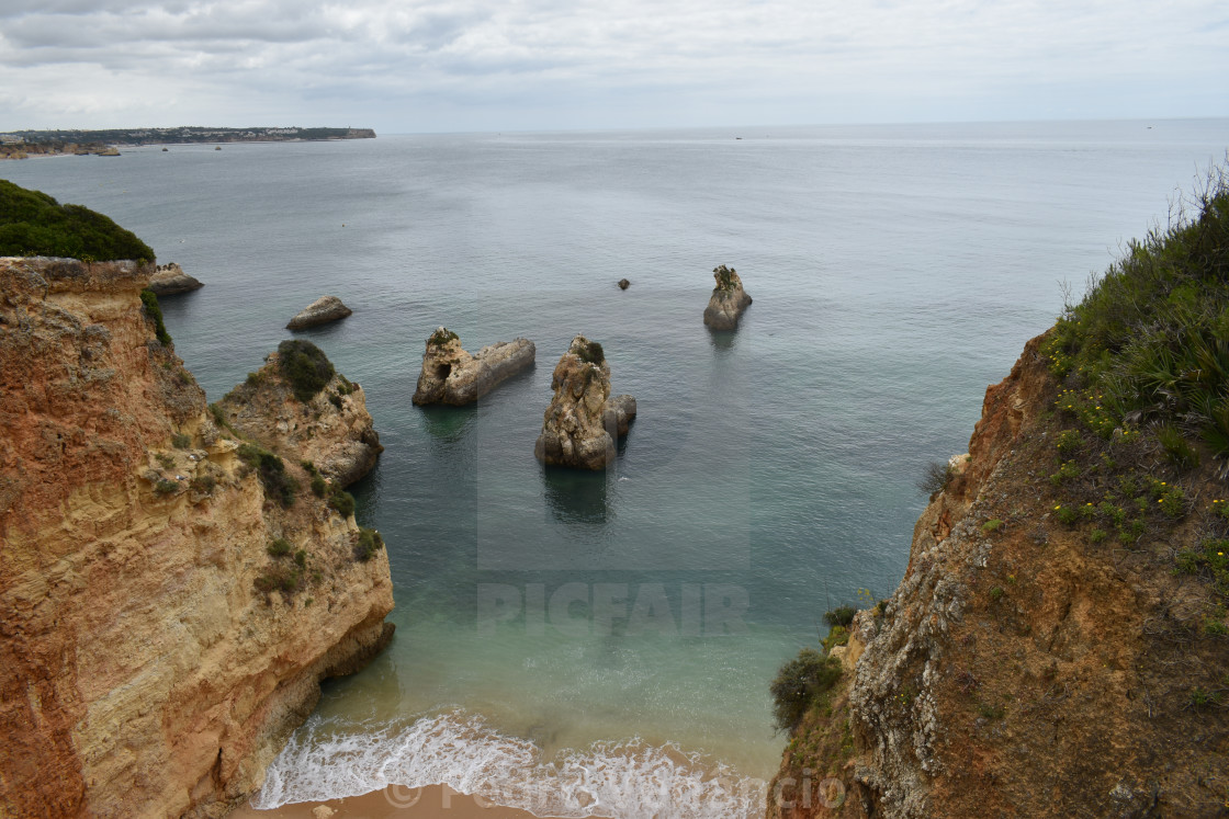 "rocky coast beach and nature" stock image