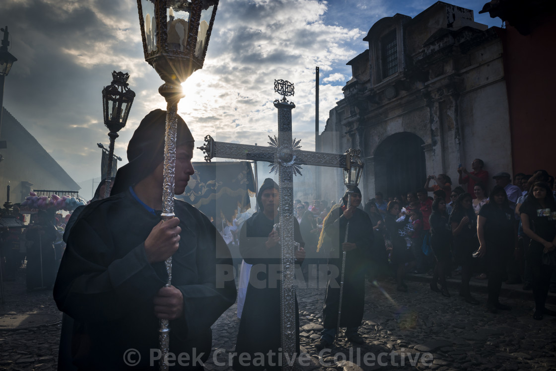 "Penitents in an Easter procession during the Holy Week in Antigua, Guatemala" stock image