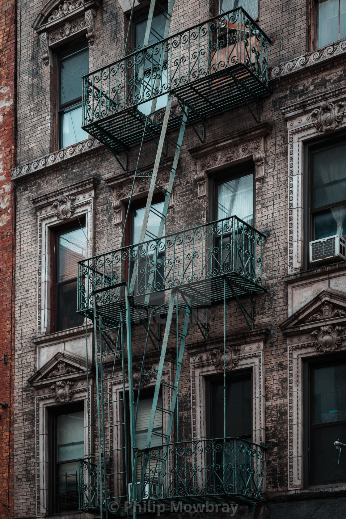 "Exterior of a typical tenement building in New York City, USA" by Philip Mowbray - $12.31 "Exterior of a typical tenement building in New York City, USA" stock image