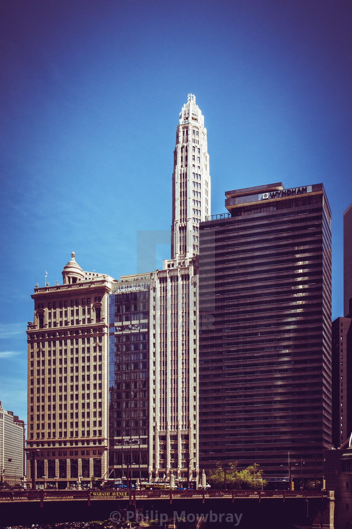 "Chicago, Illinois, USA, 20 May 2018. A stylised view of skyscrapers in Downtown Chicago, that were constructed during different periods and architectural styles, located on E. Wacker Drive." by Philip Mowbray - $12.31 "Chicago, Illinois, USA, 20 May 2018. A stylised view of skyscrapers in Downtown Chicago, that were constructed during different periods and architectural styles, located on E. Wacker Drive." stock image