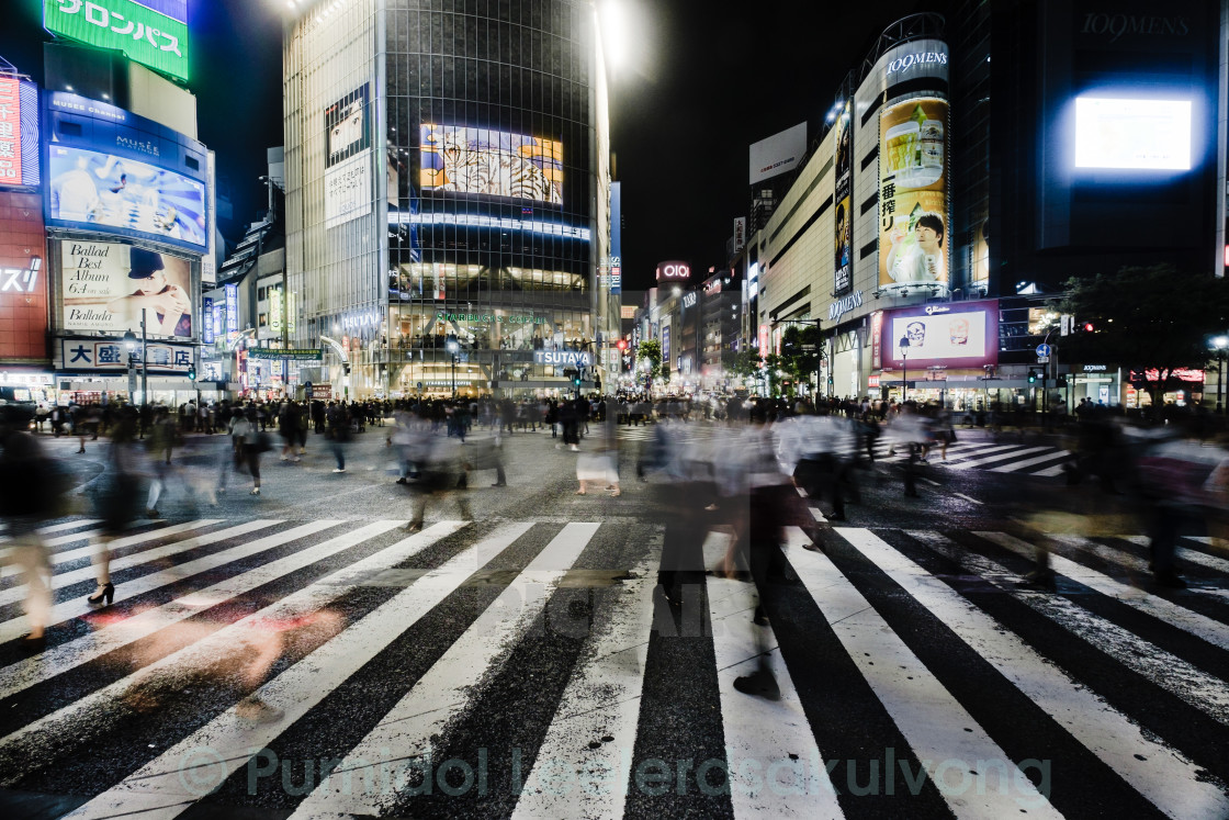 "SHIBUYA, TOKYO-CIRCA JUNE 2014: Shibuya scrambled crossing is one of the busiest of the world on circa June 2014" stock image