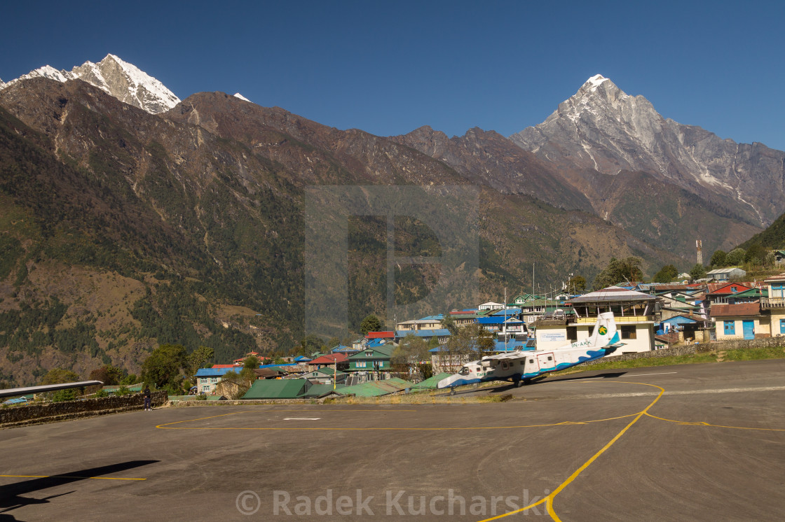 "Tara Air aircraft taking off from the Lukla Airport" stock image