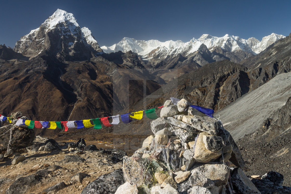 "View from the ridge above Ama Dablam Base Camp. Taboche, Cho Oyu and Lobuche Peak among others" stock image