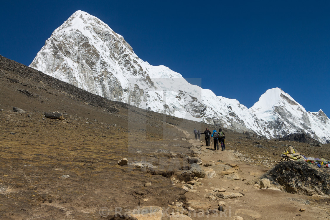 "Trekkers climbing Kala Patthar" stock image