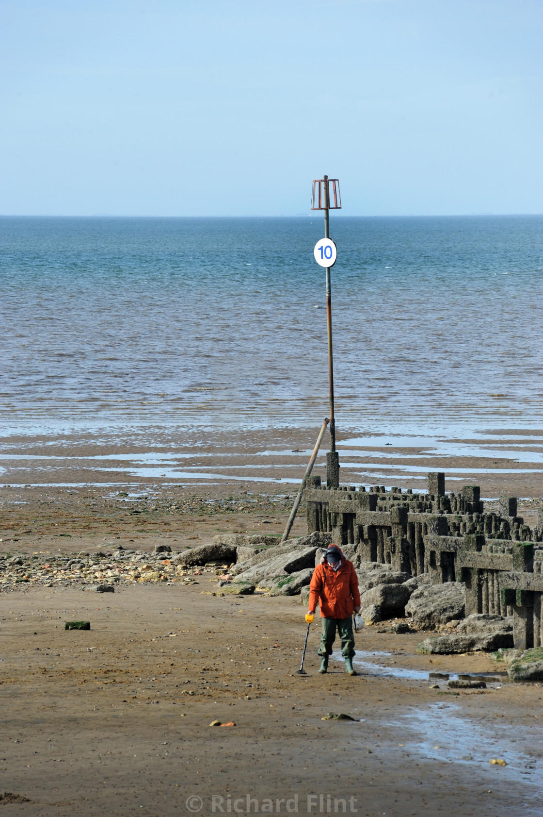 "Metal detecting on the beach - Hunstanton, Norfolk" by Richard Flint - $30.77 "Metal detecting on the beach - Hunstanton, Norfolk" stock image