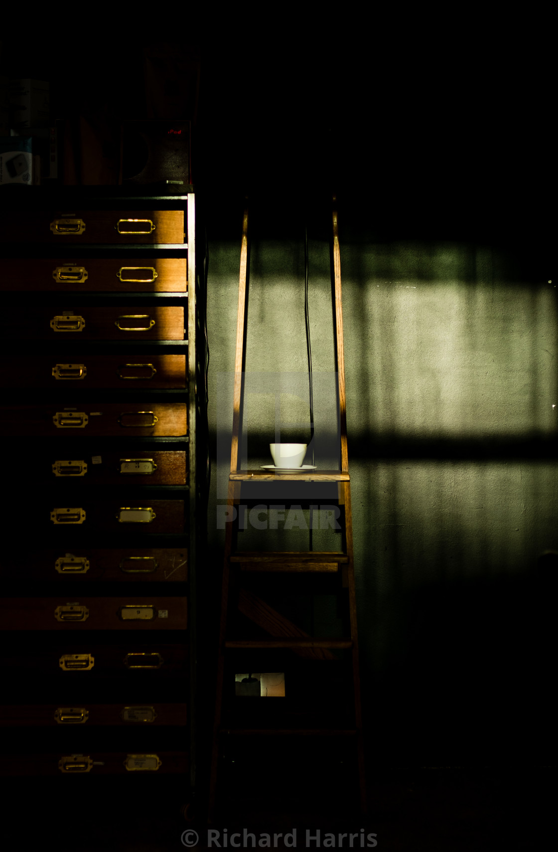 "Light pouring into coffee shop" stock image