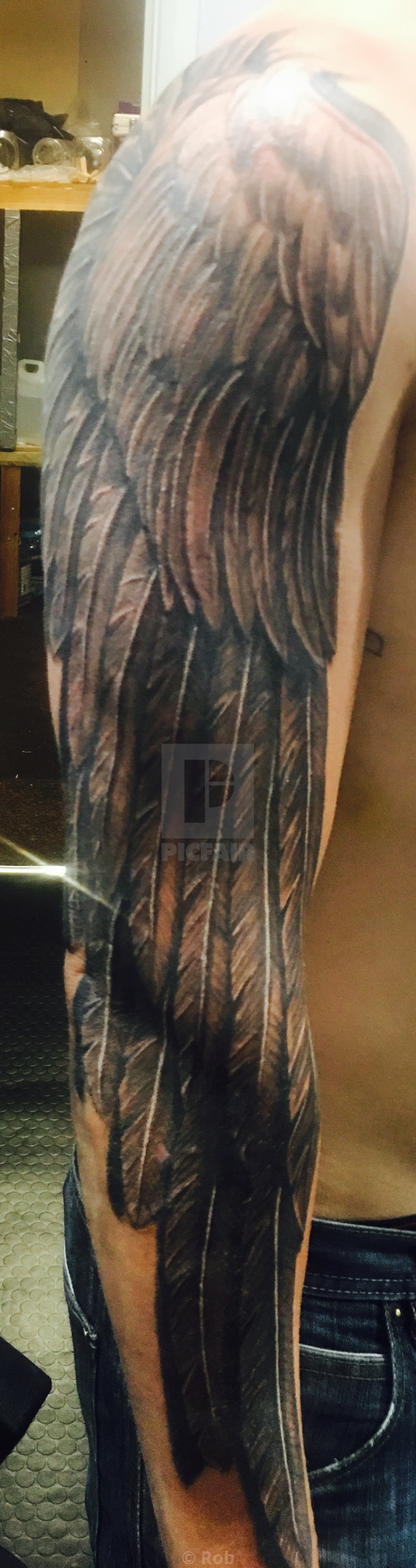 Angel wing sleeve tattoo - License, download or print for £ | Photos | Picfair Angel wing sleeve tattoo - License, download or print for £ | Photos | Picfair