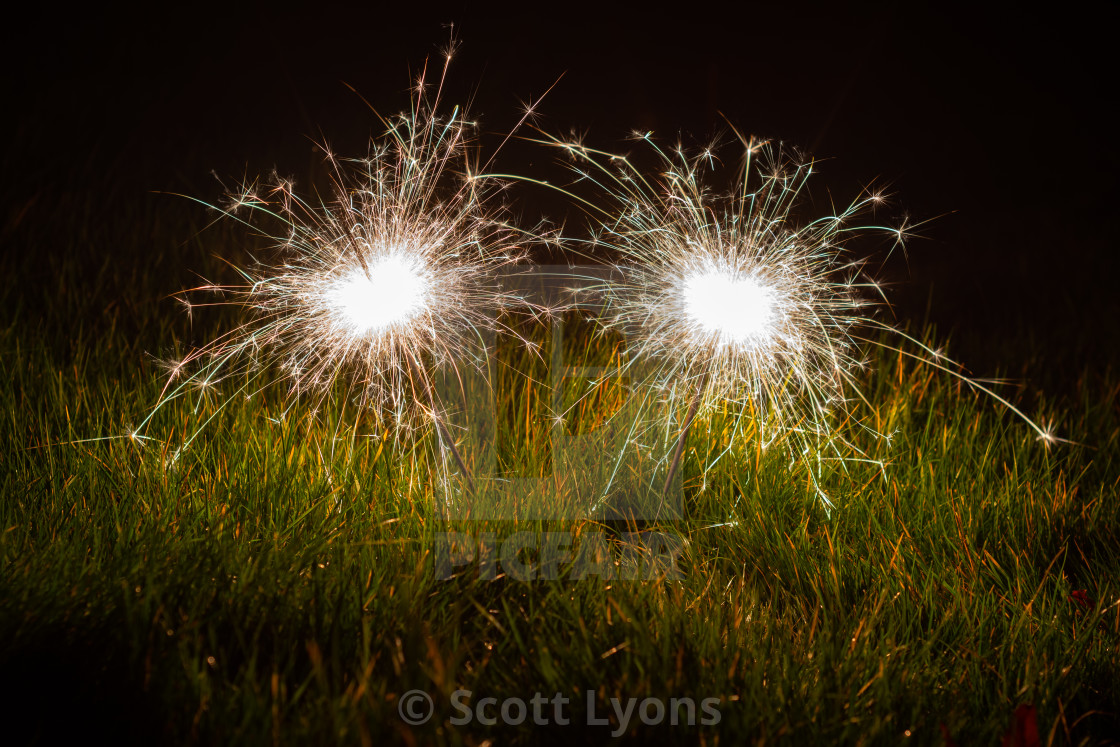 "Sparklers in the grass" stock image