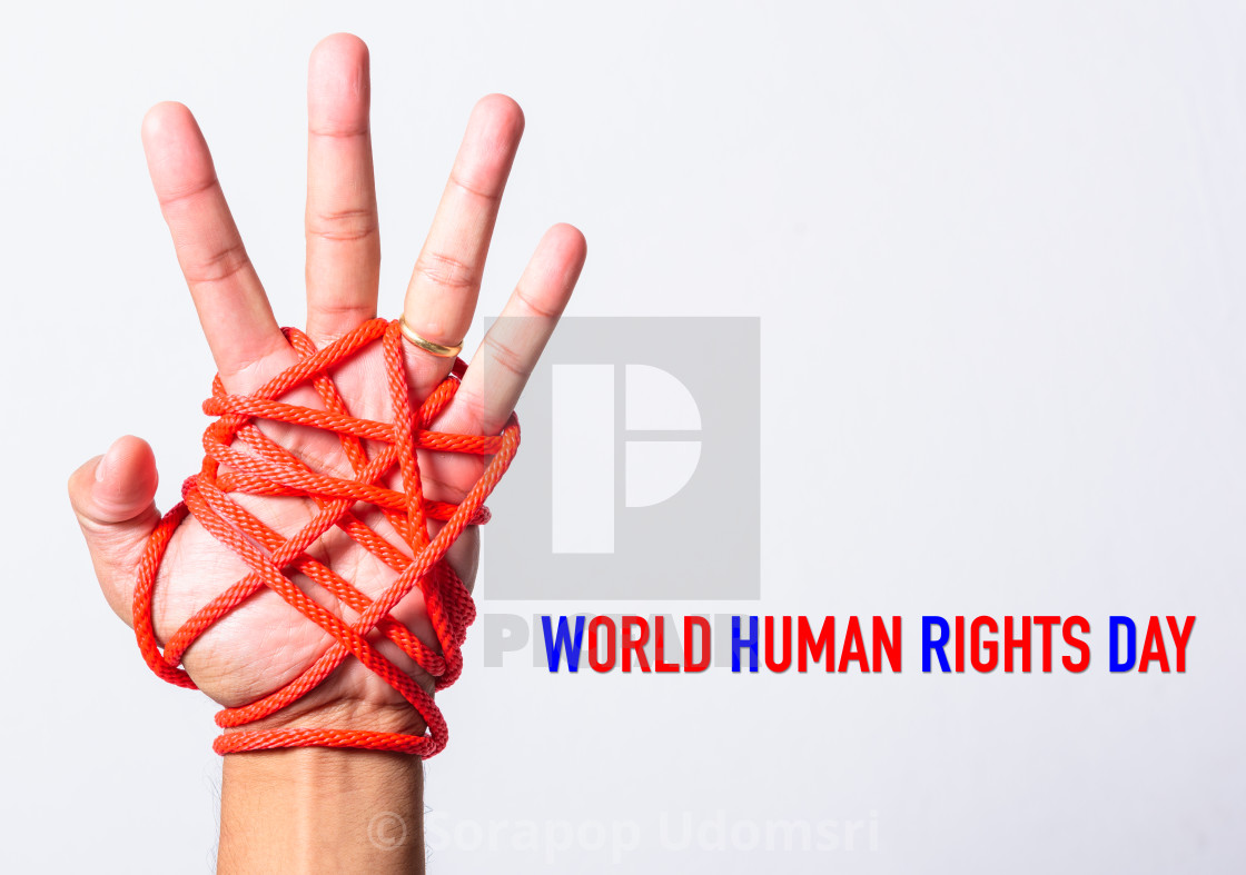Red Rope On Lift Hand With World Human Rights Day Text On White Background License Download Or Print For 12 40 Photos Picfair