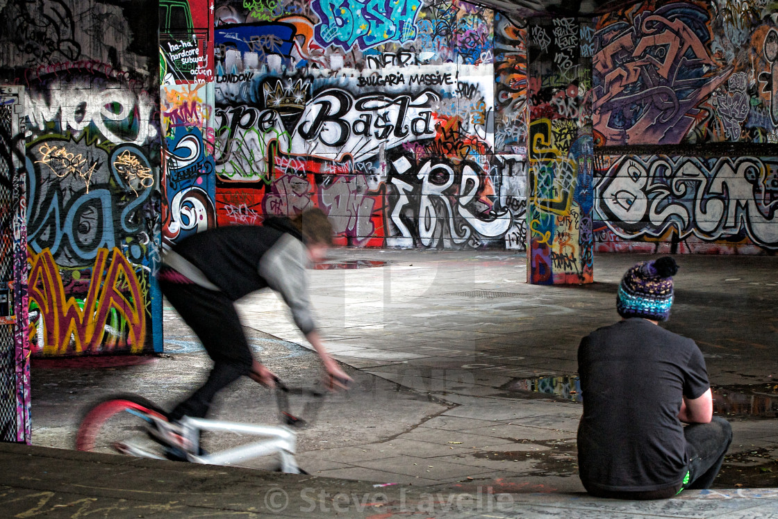 "Cyclist and Skateboarder on South Bank" by Steve Lavelle - $15.31 "Cyclist and Skateboarder on South Bank" stock image