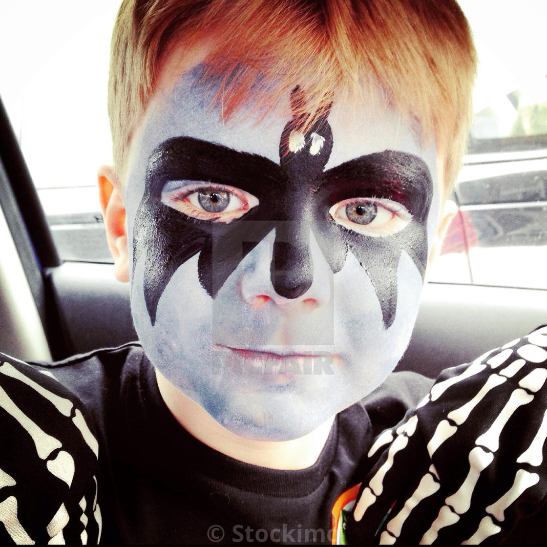 Face painting. Boy with face painted as Batman. - License, download or  print for £ | Photos | Picfair