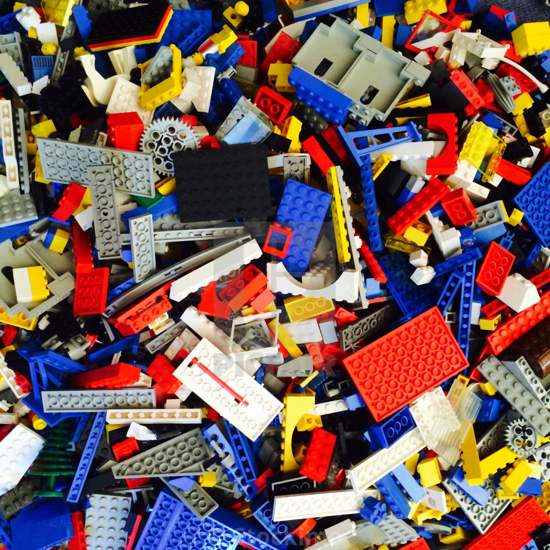 pile of assorted Lego bricks and pieces 