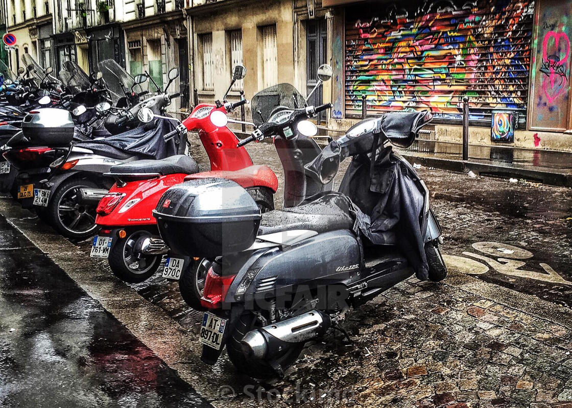 Scooters in the rain, Paris, France. - License, download or print for £31.00 | Photos | Picfair
