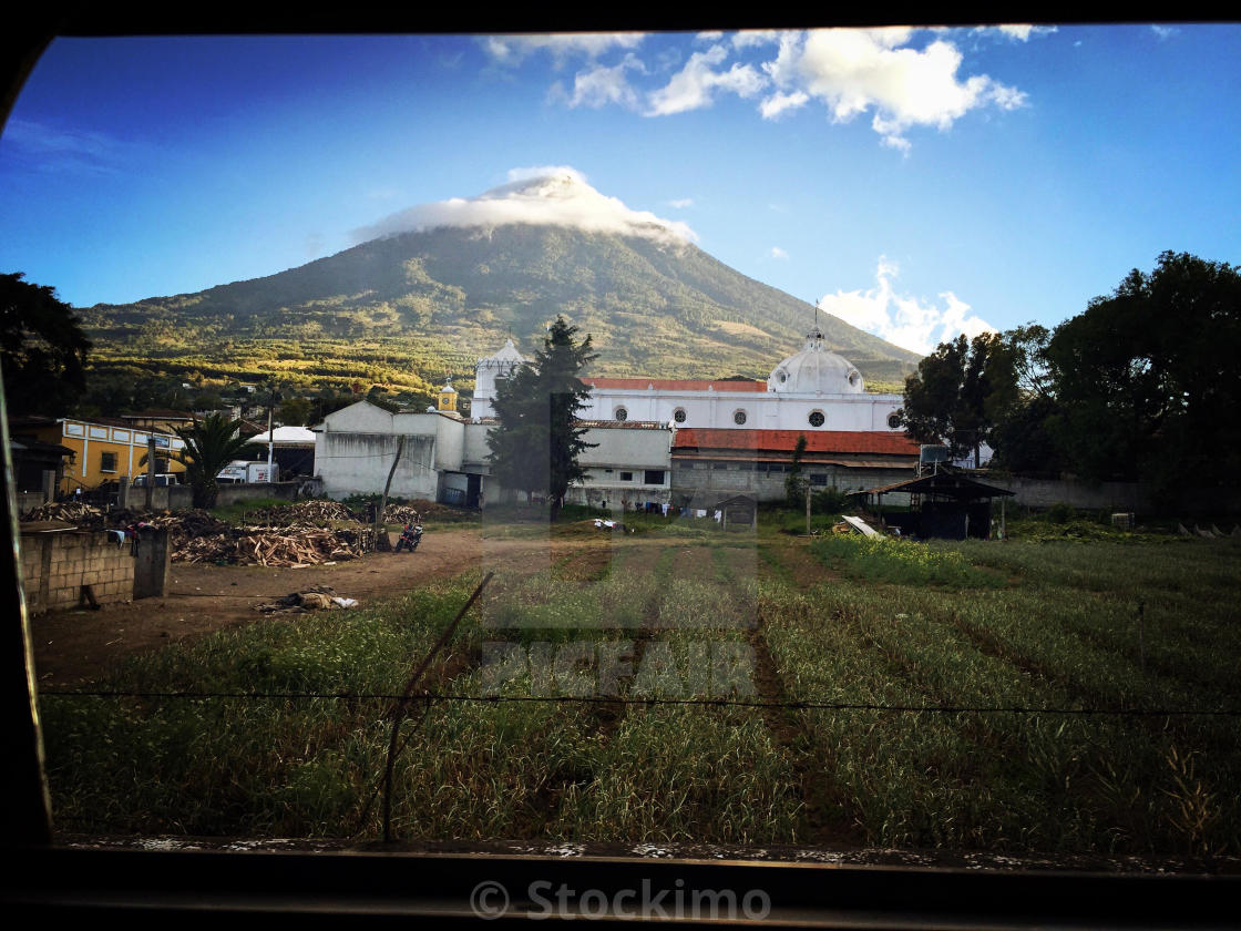 View Of Agua Volcano In Golden Hour From Bus Window Cuidad Vieja Guatemala License Download Or Print For 31 00 Photos Picfair