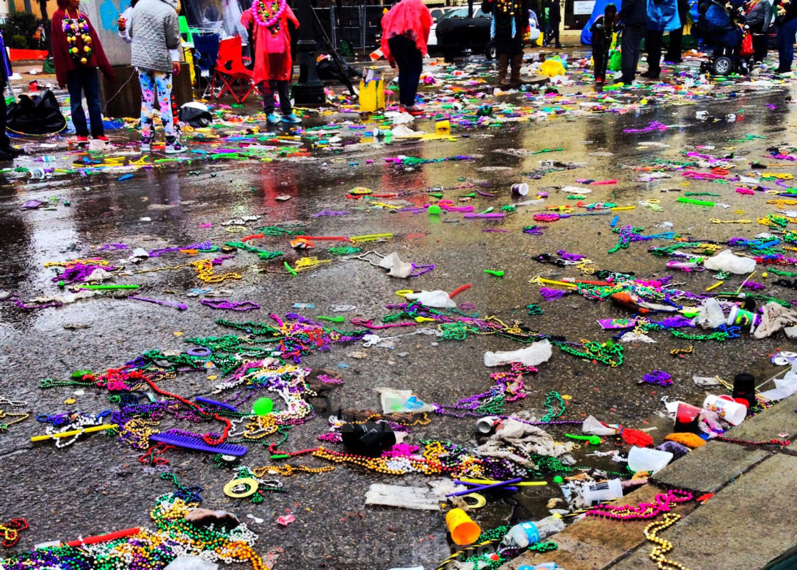 "Mardi Gras beads and throws on St. Charles Avenue after parade in New Orleans" stock image