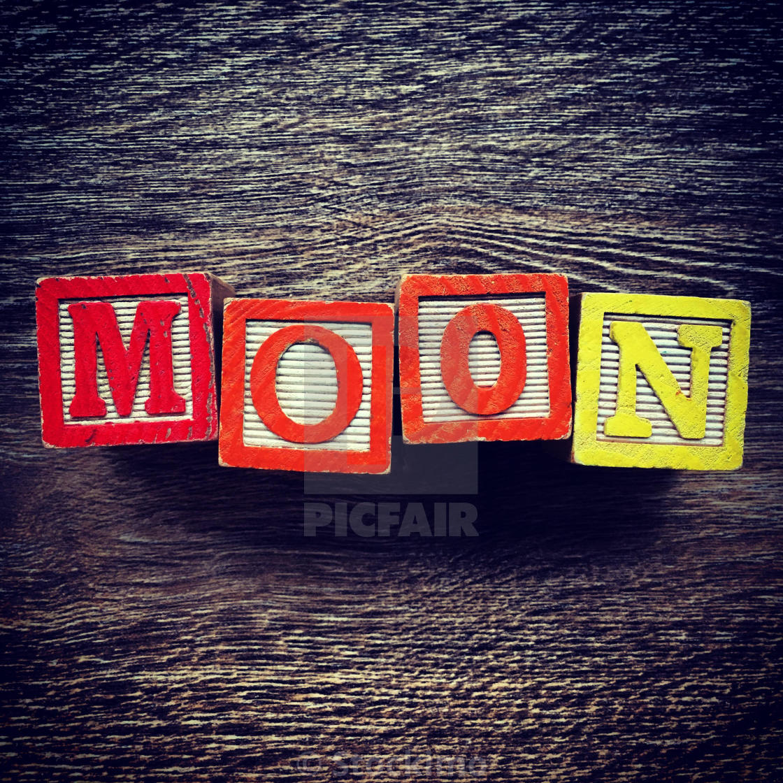 "MOON word written with wood block letter toys" stock image