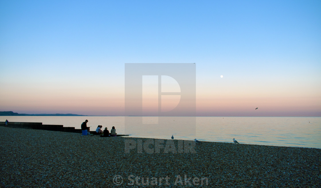 "Dusk on Lyme Regis Bay" stock image