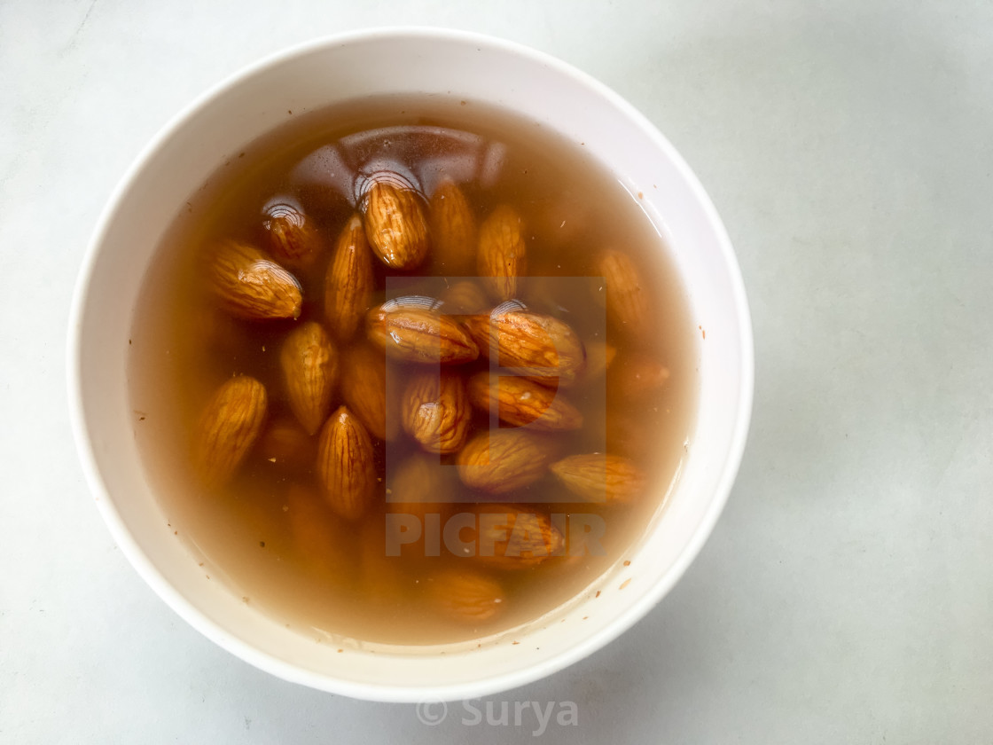"Soaked almonds" by Surya - $15.39 "Soaked almonds" stock image