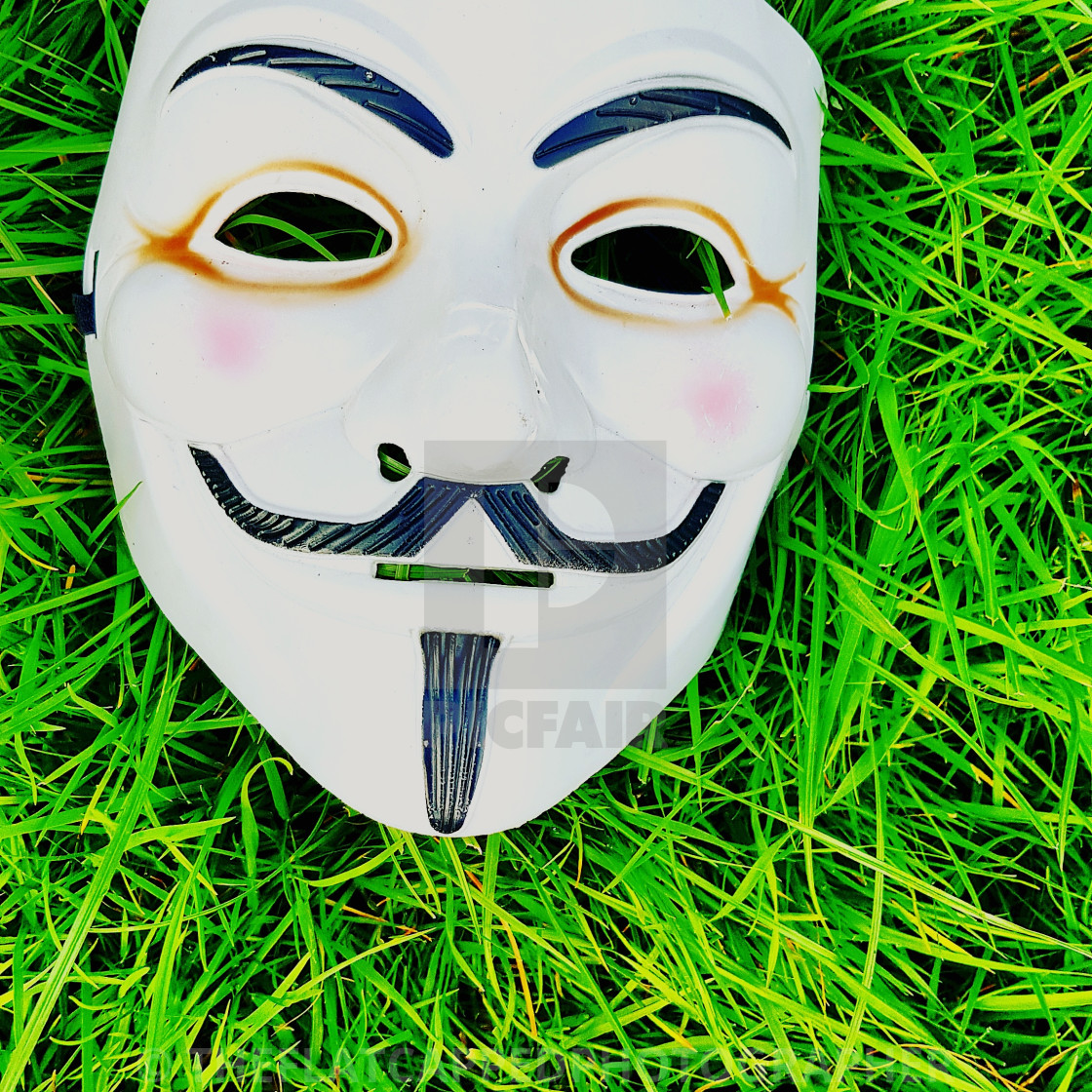 cyklus Periodisk karakter Plastic ANONYMOUS mask on grass - License, download or print for £18.60 |  Photos | Picfair