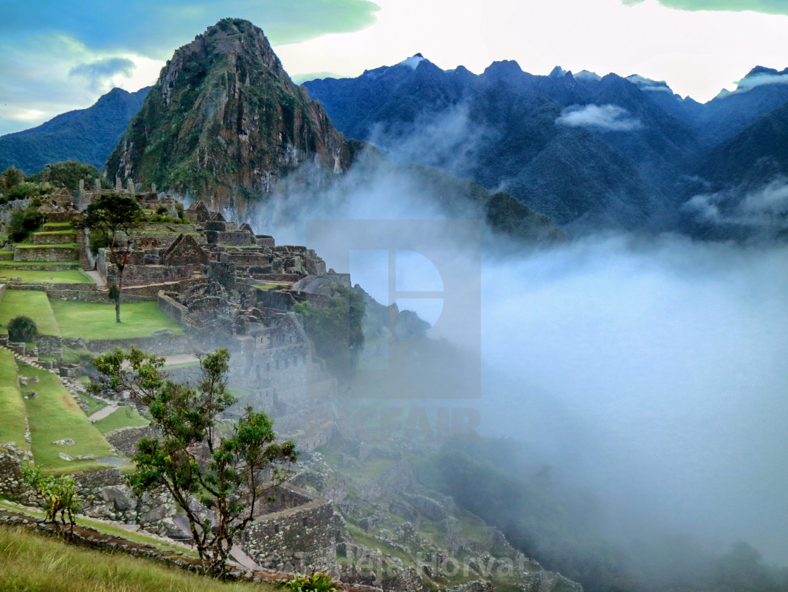 "Misty view of Machu Picchu after the rain" by Tadeja Horvat - $15.88 "Misty view of Machu Picchu after the rain" stock image