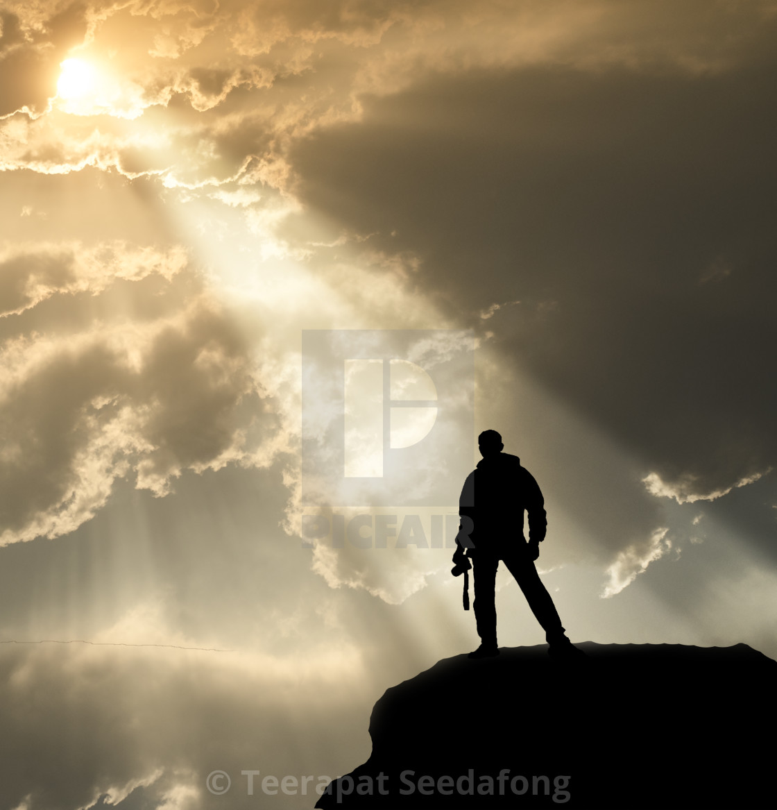 cameraman silhouette standing on cliff with light and sky and cloud background,employee waiting command from leader - License, download or print for £24.80 | Photos | Picfair