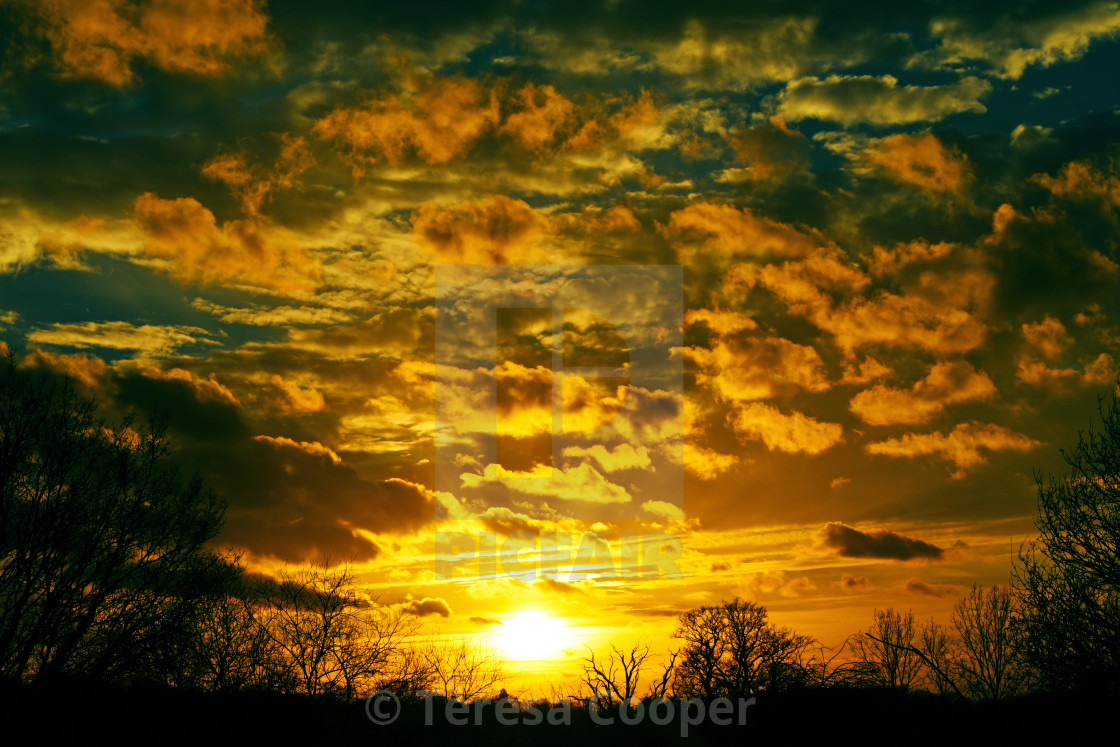 "Sunset and Golden Clouds" stock image